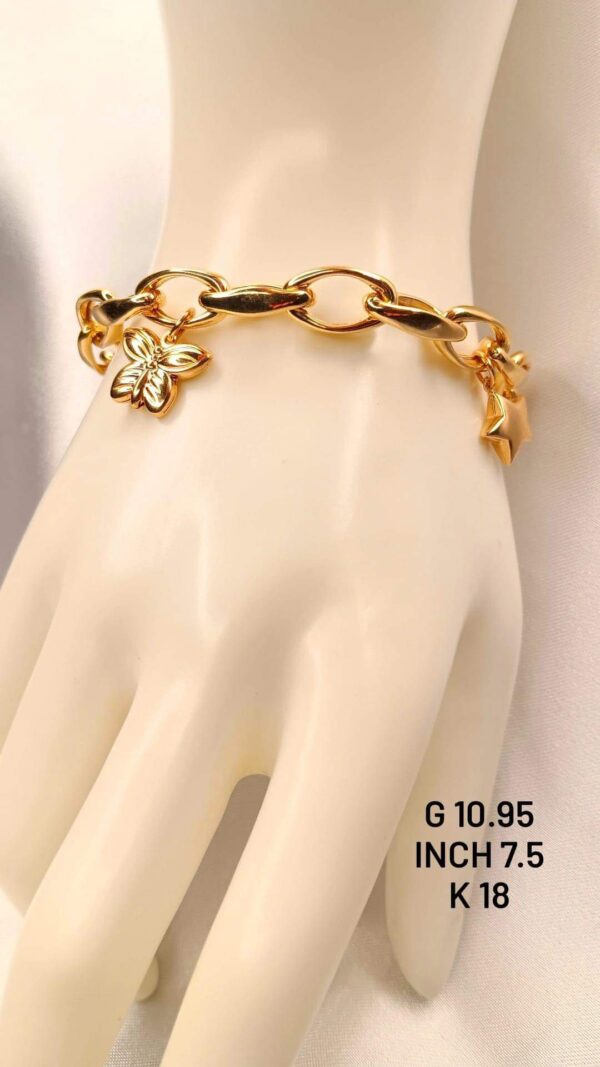 10,95g_ 18k_bracelet_with_charm_7,5 inch